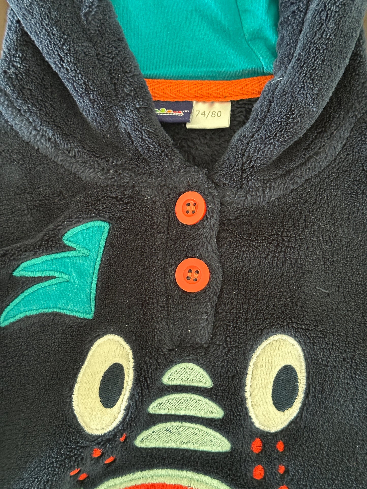 Flauschiger Pullover mit Drache Gr. 74/80