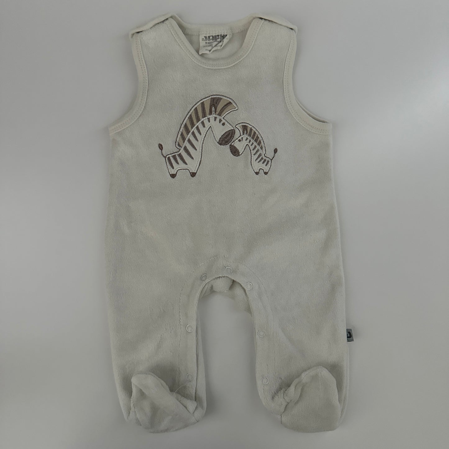 Jodler Baby-Strampler Gr. 56 Creme mit Zebra-Motiv