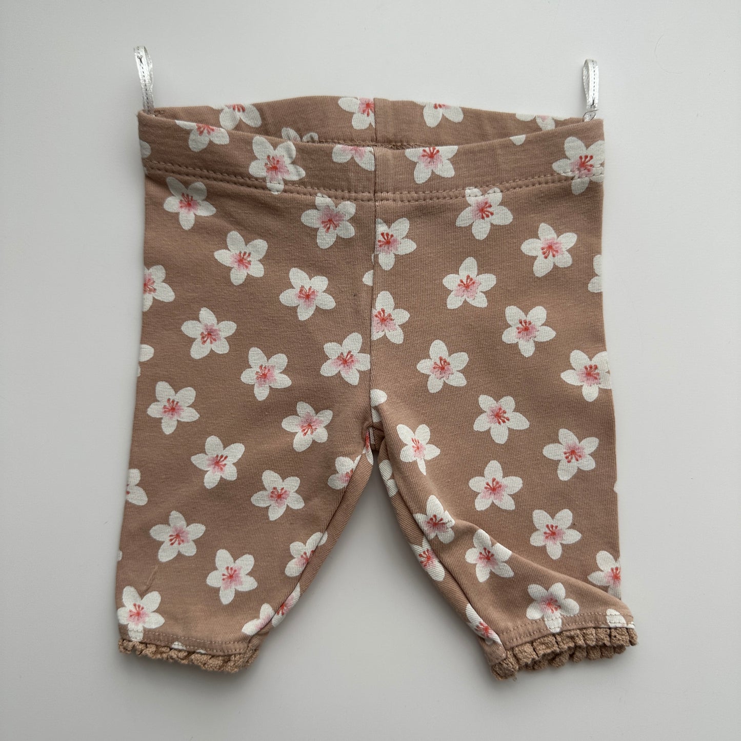 C&A Baby Leggings Blumen Gr. 62 – Beige mit Blütenmuster