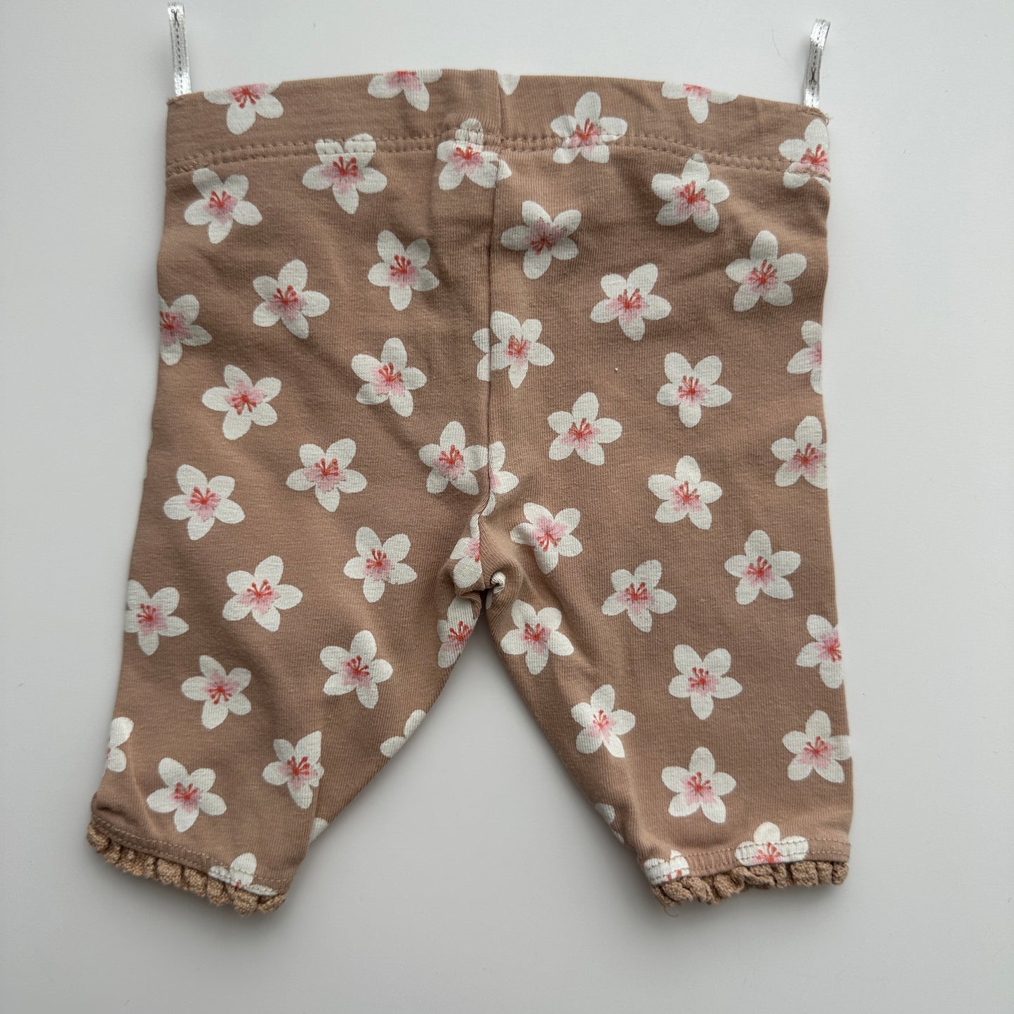 C&A Baby Leggings Blumen Gr. 62 – Beige mit Blütenmuster