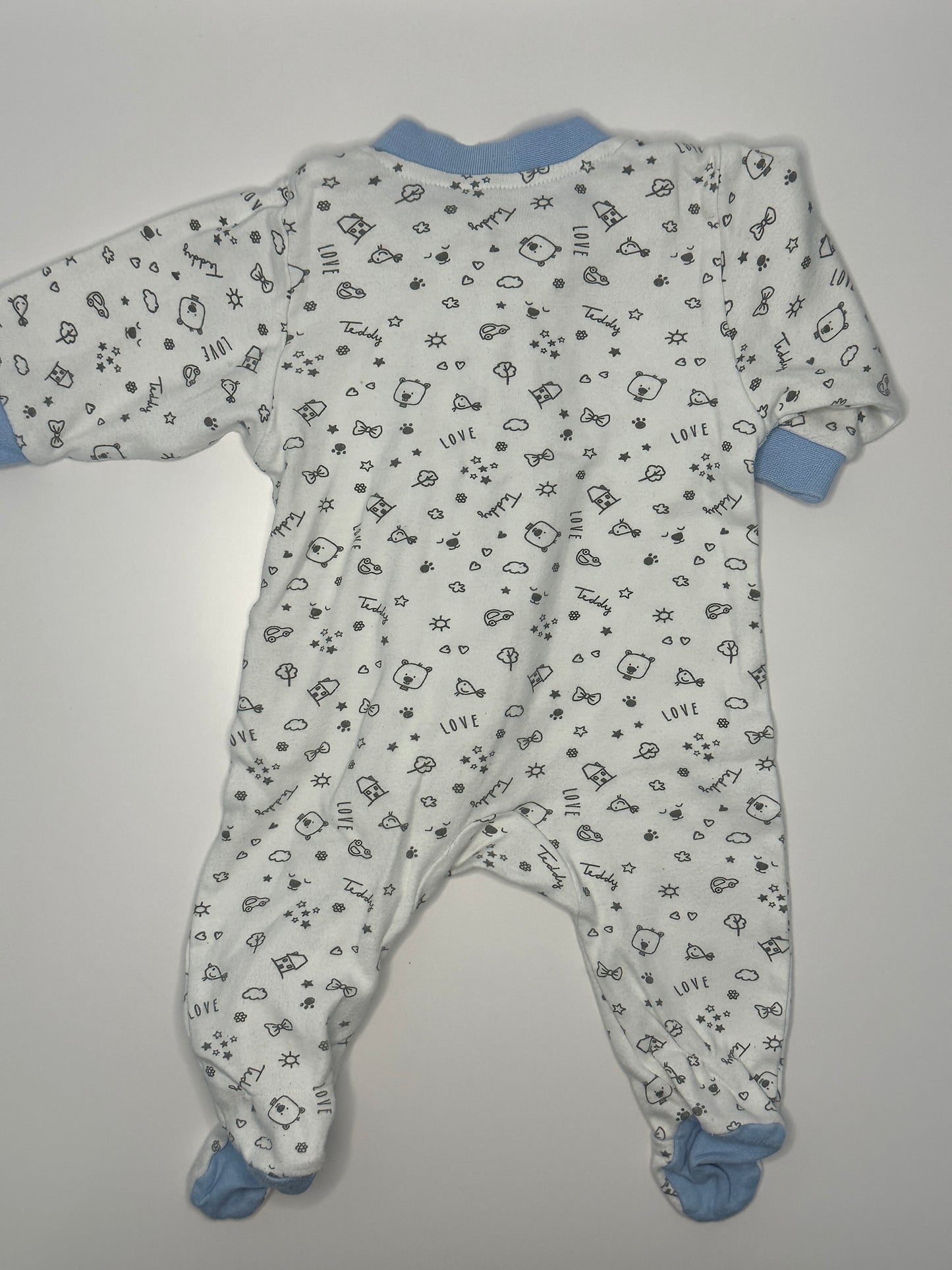 Strampler / Pyjama mit Füsschen Gr. 56